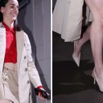 WNBA player, Caitlin Clark, wears GapStudio Collection 01 Tailored Trench Coat, GapStudio Collection 01 khaki Twill Sailor Skort and custom GapStudio red Poplin Cropped Shirt designed by Gap Inc’s Executive Vice President and Creative Director, Zac Posen, during the Indiana Fever versus Atlanta Dream game tunnel walk.