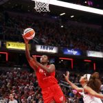Caitlin Clark's triple-double leads Fever past Sky in opener
