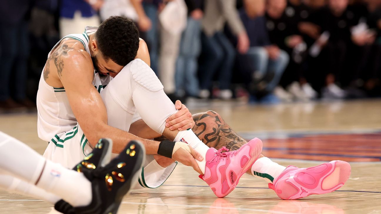Celtics’ Jayson Tatum carried off in Game 4 with leg injury
