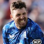 Jamie Overton raced off the field after breaking his little finger attempting a caught-and-bowled