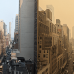 Photos of New York City in haze, as seen in the Garment District at manufacturer Wing & Weft Gloves. Left to right: images taken on Wed. June 7 at 9:30 a.m. and 1:15 p.m.