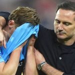 Coventry head coach Frank Lampard consoles Jack Rudoni.