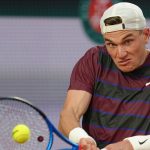 Britain's Jack Draper returns the ball to Italy's Mattia Bellucci during their first round match of the French Tennis Open, at the Roland-Garros stadium, in Paris, Tuesday, May 27, 2025. (AP Photo/Aurelien Morissard)