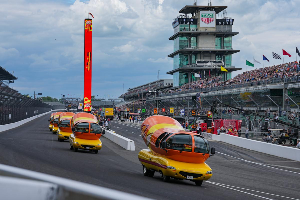 Hot diggity dog! Wienermobiles put on riveting race in Wienie 500 at Indianapolis Motor Speedway