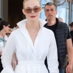 Elle Fanning wears Giuseppe Zanotti's Angular Heels and Max Mara Shirt Dress is seen at Hotel Martinez during day twelve of the 78th Cannes Film Festival on May 24, 2025 in Cannes, France.