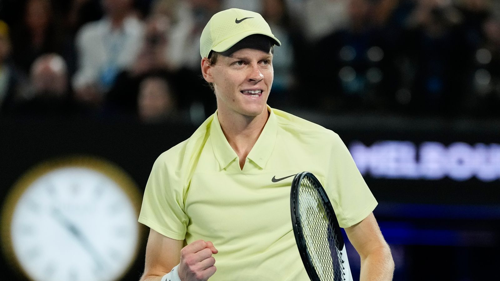 Jannik Sinner of Italy celebrates after defeating Ben Shelton of the U.S. in their semifinal match at the Australian Open tennis championship in Melbourne, Australia, Friday, Jan. 24, 2025. (AP Photo/Ng Han Guan)