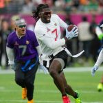 FILE - AFC wide receiver Brian Thomas Jr. (7), of the Jacksonville Jaguars, runs away from NFC return specialist KaVontae Turpin, of the Dallas Cowboys, right, during the flag football event at the NFL Pro Bowl, Sunday, Feb. 2, 2025, in Orlando. (AP Photo/Chris O'Meara, File)