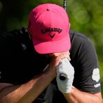 Jon Rahm, of Spain, reacts to his tee shot on the 14th hole during the final round of the PGA Championship golf tournament at the Quail Hollow Club, Sunday, May 18, 2025, in Charlotte, N.C. (AP Photo/George Walker IV)