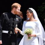 WINDSOR, UNITED KINGDOM - MAY 19: Britain's Prince Harry, Duke of Sussex and his wife Meghan, Duchess of Sussex leave from the West Door of St George's Chapel, Windsor Castle, in Windsor on May 19, 2018 in Windsor, England. (Photo by Ben STANSALL - WPA Pool/Getty Images)