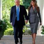 WASHINGTON, DC - MAY 19: U.S. President Donald Trump and First Lady Melania Trump arrive at the signing ceremony for the TAKE IT DOWN Act in the Rose Garden of the White House on May 19, 2025 in Washington, DC. The first lady made the Tools to Address Known Exploitation by Immobilizing Technological Deepfakes on Websites and Networks (TAKE IT DOWN) Act a priority, traveling to Capitol Hill to lobby lawmakers and show her support for the legislation, which addresses non-consensual intimate imagery, or "revenge porn," and artificial intelligence deepfakes posted online and to social media. (Photo by Chip Somodevilla/Getty Images)