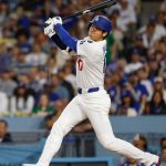Ohtani marks bobblehead night with 2 HRs in Dodgers rout