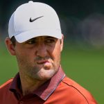 Scottie Scheffler reacts after the 16th hole during the first round of the PGA Championship golf tournament at the Quail Hollow Club, Thursday, May 15, 2025, in Charlotte, N.C. (AP Photo/David J. Phillip)