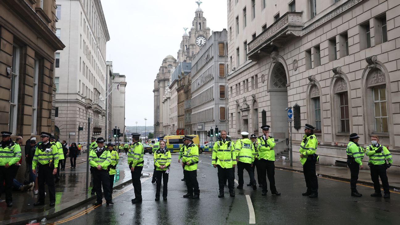 Police detain man after car collides with Liverpool parade crowd