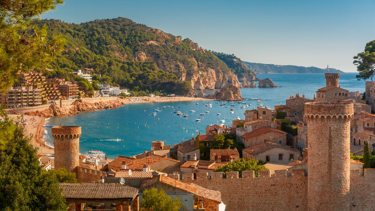 The 11 Best Places to Visit in Spain, From Royal Palaces in Madrid to Volcanic Vineyards in Lanzarote