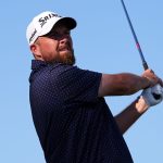 Shane Lowry, of Ireland, watches his shot on the 16th hole during the third round of the Truist Championship golf tournament at the Philadelphia Cricket Club, Saturday, May 10, 2025, in Flourtown. (AP Photo/Matt Rourke)