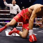 Callum Simpson is knocked down by Ivan Zucco in the opening round