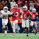 Ohio State defensive end Jack Sawyer (33) returns a fumble recovery for a touchdown against Texas during the 2025 Cotton Bowl at AT&T Stadium in Arlington, Texas.