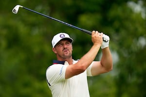 DeChambeau misses cut at US Open, then looks for answers in the rain