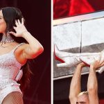 Dua Lipa performs onstage during her Radical Optimism tour wearing Christian Louboutin crystal-mesh knee-high boots at Anfield on June 24, 2025 in Liverpool, England.