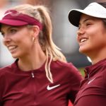 Katie Boulter (GBR) with Emma Raducanu (GBR) during their women's doubles Round 2 match against Lyudmila Kichenok (UKR) and Erin Routliffe