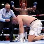 Fabio Wardley holds his hands aloft after his incredible 10th-round knockdown of Justis Huni