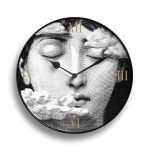Wall clock from the Fornasetti “Tema e Variazioni" collection.