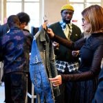 Visitors check out the Canex booth at the Tranoï trade show in Paris