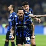 MILAN, ITALY - MARCH 08: Hakan Calhanoglu of FC Internazionale celebrates scoring his team