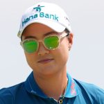 Minjee Lee waves her ball after sinking a putt on the first green during the final round of the Women's PGA Championship golf tournament Sunday, June 22, 2025, in Frisco, Texas. (AP Photo/LM Otero)