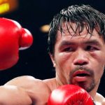 FILE - Manny Pacquiao fights Adrien Broner, not pictured, in a welterweight championship boxing match Saturday, Jan. 19, 2019, in Las Vegas. (AP Photo/John Locher, File)