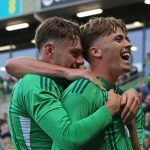 Isaac Price celebrates scoring the winner for Northern Ireland vs Iceland