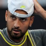 Nick Kyrgios of Australia prepares to serve to Jacob Fearnley of Britain during their first round match at the Australian Open tennis championship in Melbourne, Australia, Monday, Jan. 13, 2025. (AP Photo/Ng Han Guan)
