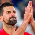 Novak Djokovic of Serbia acknowledges the crowd as he leaves the court after defeat against Jannik Sinner of Italy during the Men's Singles