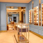 A rendering of the interior of Oliver Peoples Paris store.