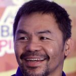 Pacquiao eyes history, promises 'the old Manny' in July return