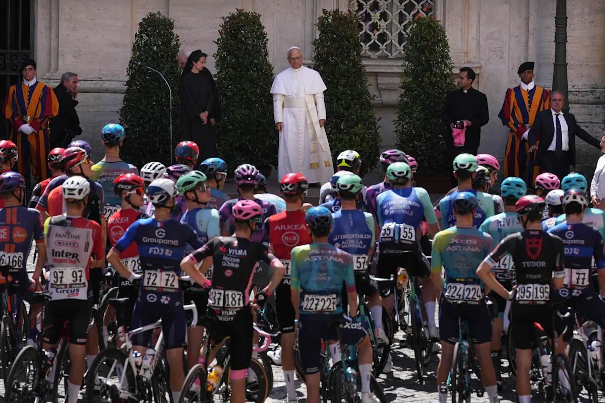 Pope Leo XIV blesses cyclists competing in the Giro d’Italia as final stage enters Vatican gardens