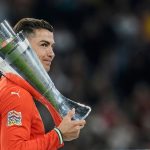 Cristiano Ronaldo holds the trophy after Portugal won the Nations League final