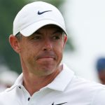 Rory McIlroy, of Northern Ireland, stands on the 11th green after putting in during the final round of the U.S. Open golf tournament at Oakmont Country Club Sunday, June 15, 2025, in Oakmont, Pa. (AP Photo/Gene J. Puskar)