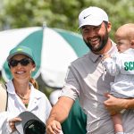 Ben Jared/PGA TOUR via Getty Scottie Scheffler (center) with wife Meredith and son Bennett on April 9, 2025