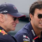 Red Bull technical director Adrian Newey is flanked by Red Bull driver Sergio Perez of Mexico and former F1 driver Alain Prost arrive ahead the third free practice, at the Monaco racetrack, in Monaco, Saturday, May 25, 2024. The Formula one race will be held on Sunday. (AP Photo/Luca Bruno)