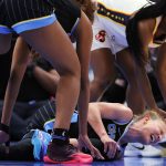 Sky's Vandersloot injures knee vs. Fever, carried off court