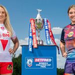 Picture by Allan McKenzie/SWpix.com - 02/06/2025 - Rugby League - Betfred Challenge Cup Final Preview - Oulton Hall, Rothwell, England - St Helens' Jodie Cunningham & Wigan's Vicky Molyneux with the Women's Betfred Challenge Cup trophy.