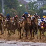 Sovereignty (dark blue cap) wins the Kentucky Derby, ahead of Journalism and Baeva