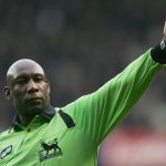 Uriah Rennie in action during a Premiership match between Tottenham Hotspur and Wigan Athletic in 2006