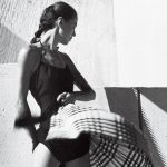 The model Sabine wears a skirt and swimsuit by Claire McCardell.