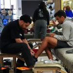 shoe store, sales person