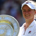 Barbora Krejcikova of Czechia poses with the Ladies' Singles Trophy following victory against Jasmine Paolini of Italy during her Ladies' Singles Final match during day thirteen of The Championships Wimbledon 2024 at All England Lawn Tennis and Croquet Club on July 13, 2024 in London, England. (Photo by Julian Finney/Getty Images)