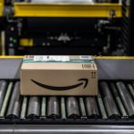 BRIESELANG, GERMANY - NOVEMBER 18: A package flows along a conveyor belt at an Amazon warehouse on November 18, 2021 in Brieselang, Germany. Many shoppers who fear gifts will be lacking due to the global supply chain disruption are buying their Christmas gifts early this year, both online and at brick and mortar retailers. (Photo by Maja Hitij/Getty Images)