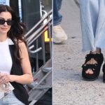 Anne Hathaway on set for "The Devil Wears Prada 2" in black velvet quilted slides by Chanel.