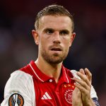 Ajax's Jordan Henderson applauds to supporters at the end of the Europa League soccer match between Ajax and Besiktas, at the Johan Cruyff ArenA, in Amsterdam, Netherlands, Thursday, Sept. 26, 2024. (AP Photo/Maurice van Steen)